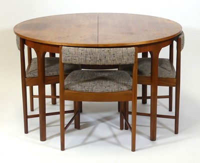 Lot 433 - A 1960s McIntosh teak dining suite, comprising;...