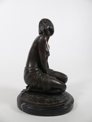 Lot 11 - A modern bronze figure of a lady, shown seated,...