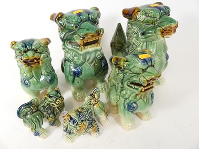 Lot 27 - A collection of six Chinese pottery models of...