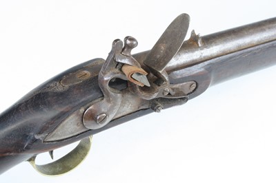 Lot 755 - An early 19th century flintlock rifle, the...