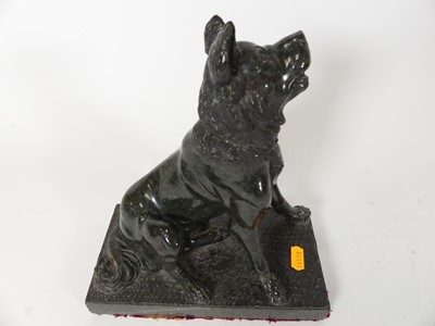 Lot 39 - A carved hardstone model of a dog, shown...