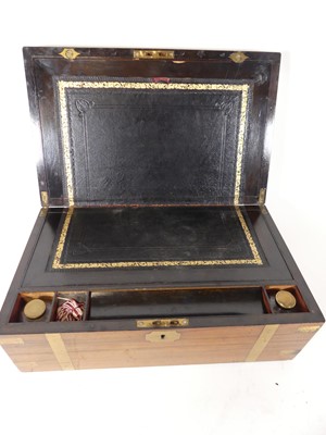 Lot 43 - A Victorian walnut and brass bound writing...