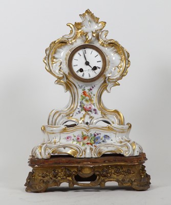 Lot 65 - A 19th century French porcelain clock, in the...