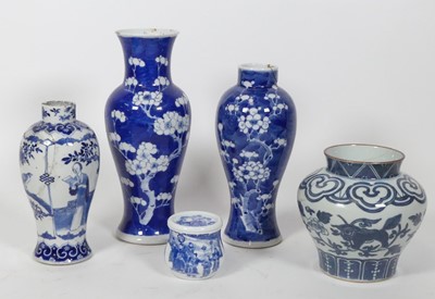 Lot 69 - A Chinese blue and white porcelain prunus vase,...