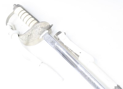 Lot 724 - An Elizabeth II dress sword, the 82cm blade...