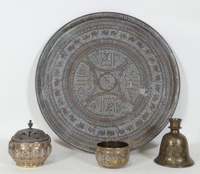 Lot 114 - An Indian copper charger, dia.58cm; together...