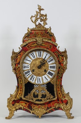 Lot 109 - A reproduction boulle type mantel clock, in...