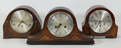 Lot 122 - An early 20th century oak cased eight-day...