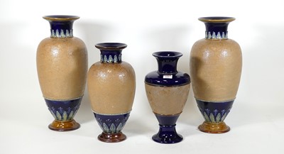 Lot 133 - A collection of four Royal Doulton stoneware...