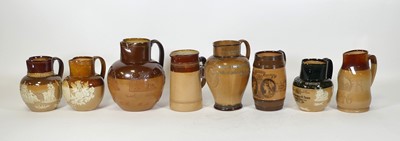 Lot 134 - A collection of eight Doulton stoneware jugs,...