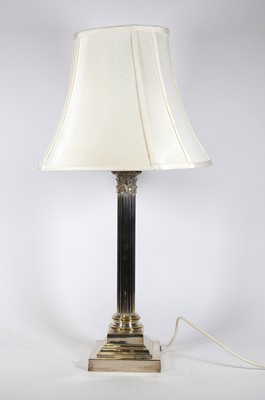 Lot 140 - A silver plated table lamp, in the form of a...