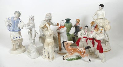 Lot 143 - A collection of Soviet porcelain figures, to...