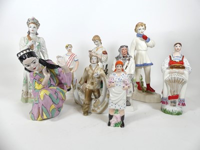 Lot 144 - A collection of Soviet porcelain figures, to...