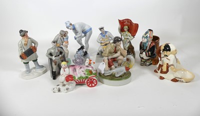 Lot 146 - A collection of Soviet porcelain figures, to...