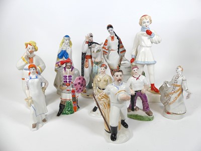 Lot 150 - A collection of Soviet porcelain figures, to...