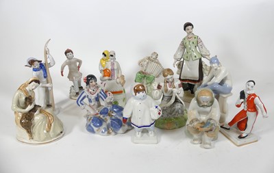 Lot 151 - A collection of Soviet porcelain figures, to...