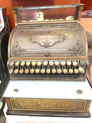 Lot 269 - A National brass cash register having a glazed...