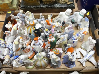 Lot 160 - A collection of Soviet porcelain figures, to...