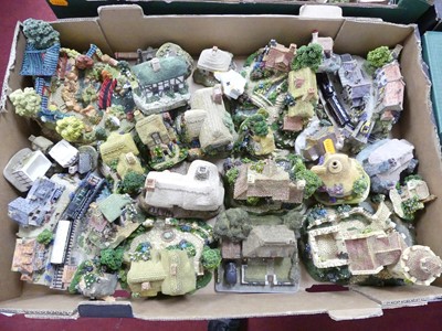 Lot 164 - A collection of resin model cottages, to...