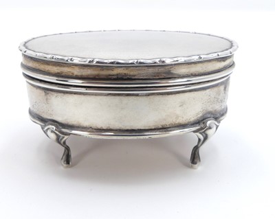 Lot 292 - An Edwardian silver trinket jar of oval form,...