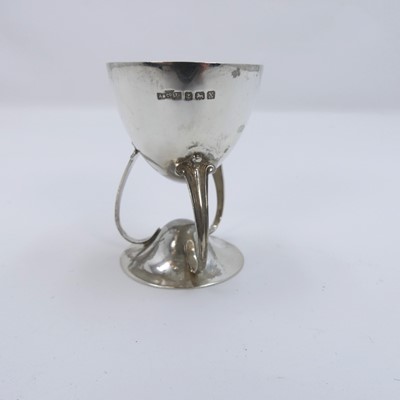 Lot 293 - An Arts & Crafts style silver eggcup, the bowl...