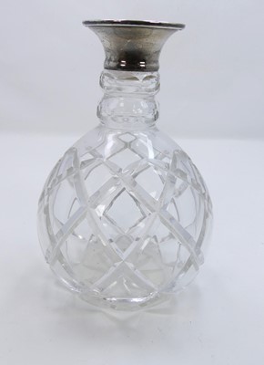 Lot 302 - An early 20th century decanter, the clear cut...