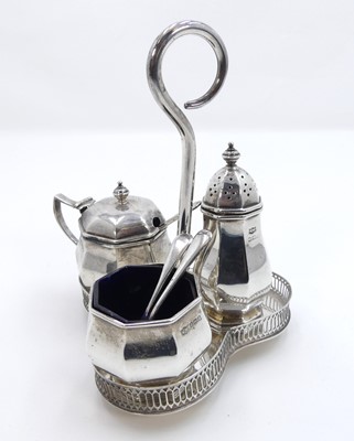 Lot 305 - A modern silver cruet stand of trefoil shape...