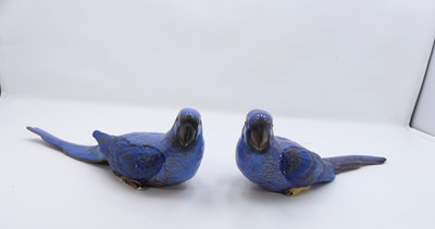 Lot 224 - A pair of blue glazed and painted porcelain...