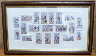 Lot 1068 - A box of assorted prints, framed display of...