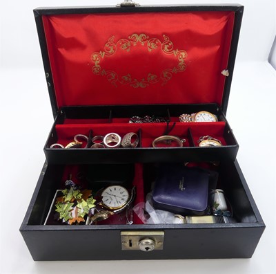 Lot 475 - A leather clad jewellery box containing...