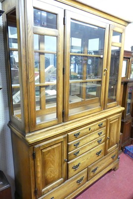 Lot 1138 - A reproduction oak and elm lounge unit, with...