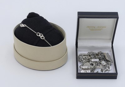 Lot 537 - A silver lady's finelink bracelet, together...