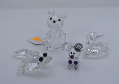 Lot 550 - A Swarovski crystal model of a frog; together...