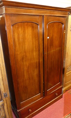 Lot 1142 - A Victorian mahogany double door wardrobe,...