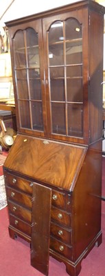 Lot 1191 - A reproduction mahogany bureau bookcase, width...