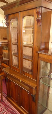 Lot 1194 - A mid-Victorian walnut narrow library bookcase,...