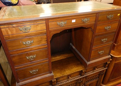 Lot 1196 - A late Victorian walnut gilt tooled green...