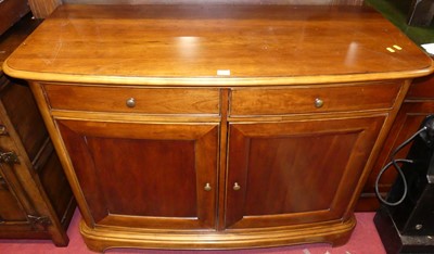 Lot 1199 - A contemporary cherry wood bow front double...