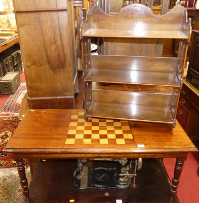 Lot 1210 - A chessboard topped inset low occasional table,...