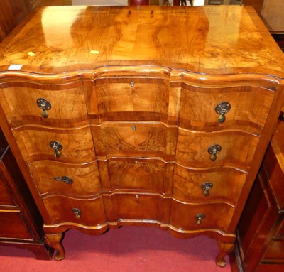 Lot 1216 - An early 20th century figured walnut and...