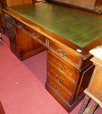 Lot 1219 - A contemporary walnut and gilt tooled green...