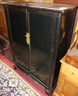 Lot 1229 - An Oriental black painted double door marriage...