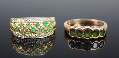 Lot 391 - A modern 14ct gold, emerald and diamond point...