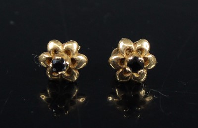 Lot 396 - A pair of modern 9ct gold sapphire set flower...