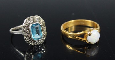 Lot 398 - A 22ct gold and cabochon opal set solitaire...