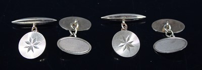 Lot 400 - A pair of 9ct gold oval cufflinks; together...