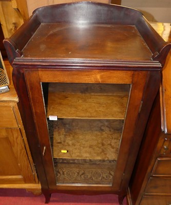 Lot 1234 - An Edwardian walnut single door glazed music...