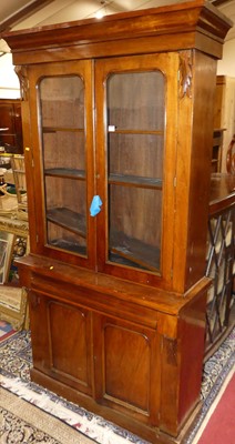 Lot 1236 - A mid-Victorian walnut narrow library bookcase,...