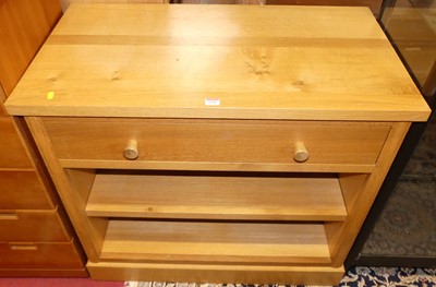 Lot 1243 - A contemporary blond oak low side cupboard,...