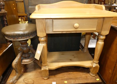 Lot 1251 - A modern pine round cornered low two-tier...